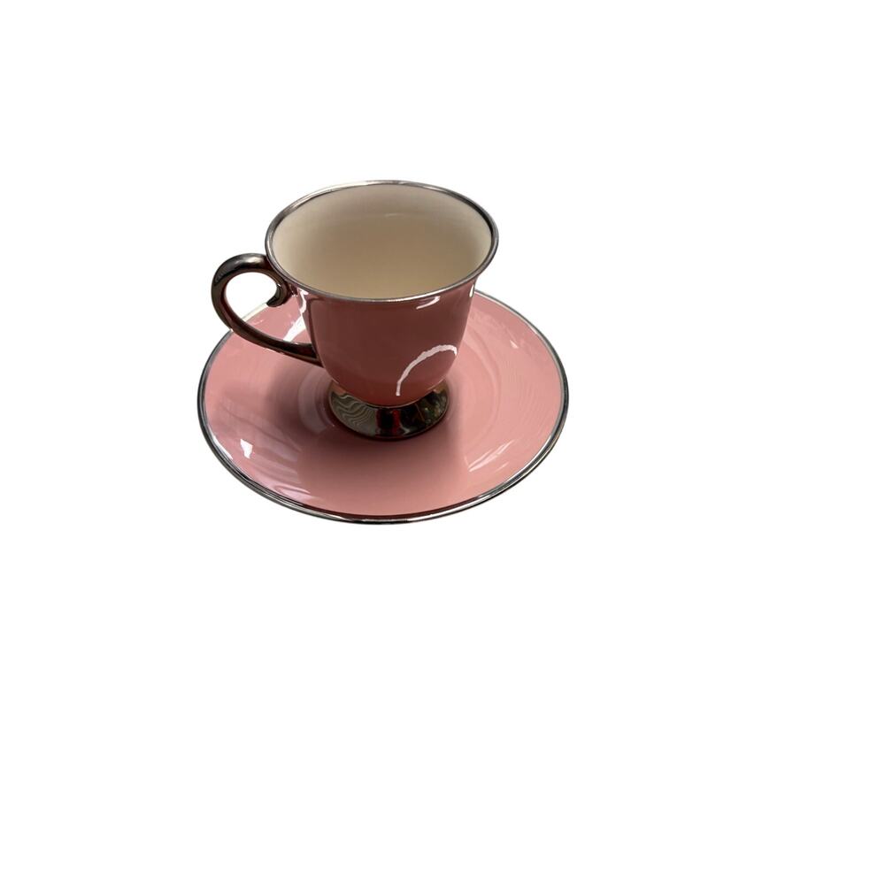 Carole Stupell demitasse cup and saucer- pink with silver border 
￼